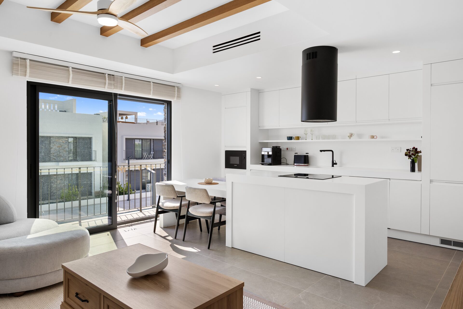 Living room opening to private terrace